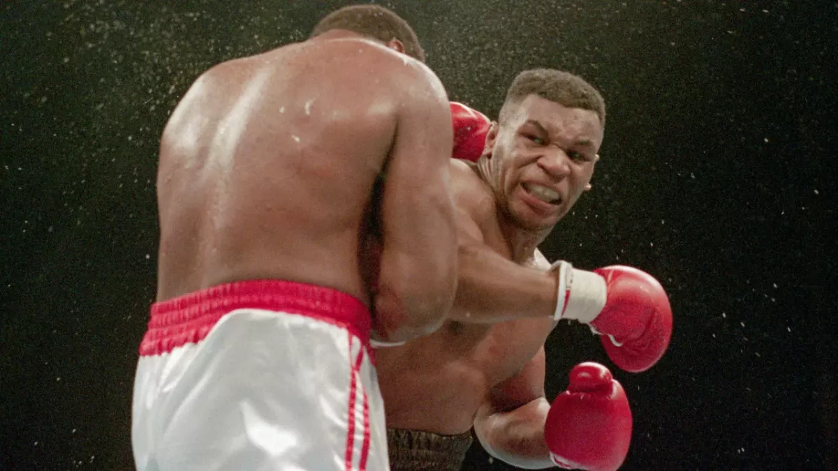Mike Tyson met KO Larry Holmes 