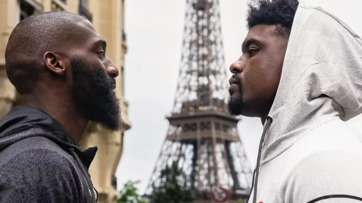 Face à face entre Cédric Doumbé et Jaleel Willis devant la Tour Eiffel. 